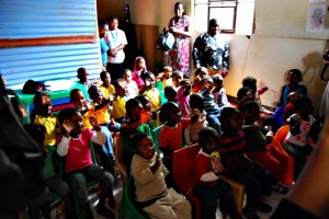 The John Marshall Law School students visited children at a child care center in Soweto. Photo by Molly Schmiege