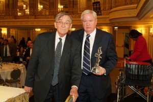 Justice James Fitzgerald Smith (right), chairman of The John Marshall Law School Alumni Association’s annual Freedom Award and Distinguished Service Awards Luncheon, prepares to present Illinois Appellate Court Justice Joseph Gordon (left) with the association’s Freedom Award at the May 13, 2011, event.