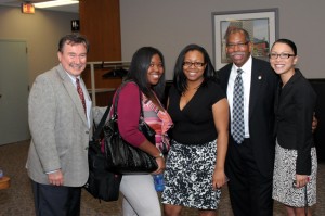 Transfer student Faith Barrett (second from left) was welcomed to The John Marshall Law School by (from left) Professor William Mock, Meta Brown (JD ’11) of the Office of Diversity Affairs; Associate Dean Rory Smith; and Teresa Do, assistant to the law school’s associate deans.