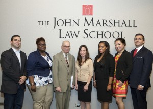 Professor Michael Seng (third from left) stands with students who participated in the year-long housing study. From left: Ralph Melbourne; Joi Lyons, project manager; Amber Madden, IDHR representative; Myka Bell; Victoria Yan; and Anthony Pasquini. Students not pictured: John Antia, Neda Brisport, Vishal Chhabria, Natasha Jackson, Rachel Kurz. 