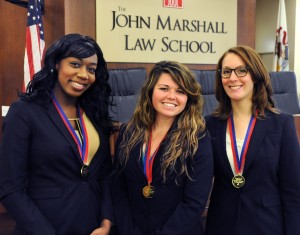 John Marshall Law School students (from left) Danielle Young, Lauren Rankins and Alexis Pool wear their medals presented as the Advocate’s Choice Award winners at the St. John’s University Fifth Annual Securities Dispute Resolution Triathlon Oct. 20. The three were recognized as the competitors having the highest degree of skill, competence and professionalism, as well as the team that judges would most likely hire or work with in the future. The team was judged on dispute resolution processes of negotiation, mediation and arbitration.
