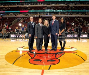 It was an “on court” salute to the Veterans Legal Support Center & Clinic on Nov. 11 when Jerry Siegel (second from left), president of Midway Moving & Storage, an official sponsor of the Chicago Bulls, welcomed (from left) Associate Dean Anthony Niedwiecki; Ashley Sloan (JD ’13), who serves with the U.S. Marine Corps; Thomas White, Jr., director of the Clinic, and a retired U.S. Army JAG officer; and Akeela White (JD ’08), who served in the U.S. Army.