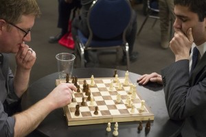 Professor William Ford (left) and his challenger Hayk Ghalumyan strategize their next moves at the Russian Speaking Organization's Chess Game Night on March 27, 2014