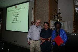 Jose Amparo Martinez and Phyllis Finney received their awards for 25 years of service. 